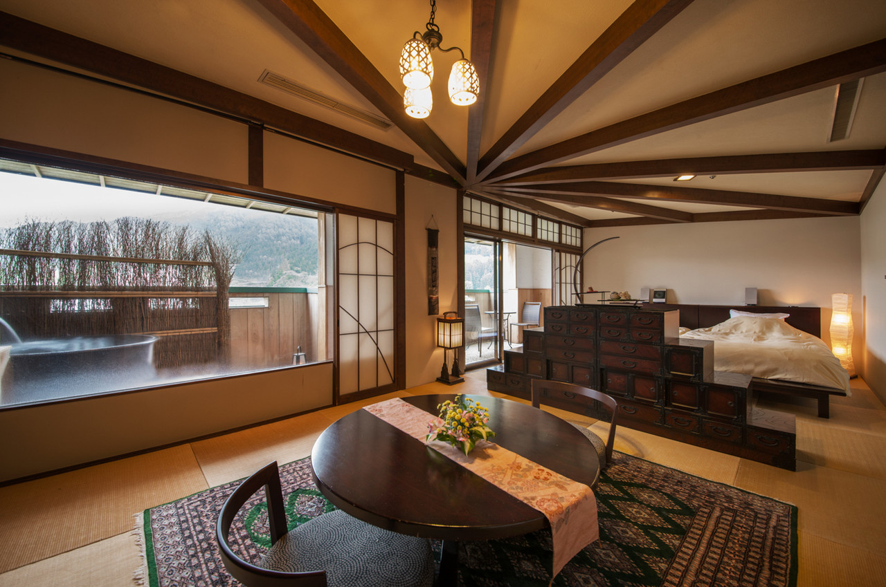 Japanese-style suite with a low table and window seating.