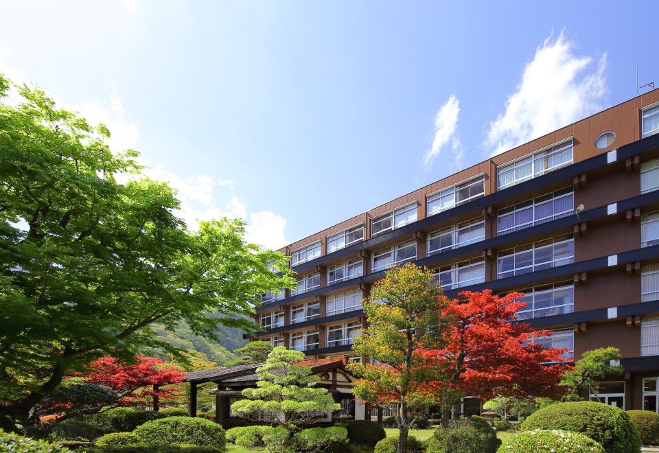 A hotel building among trees.
