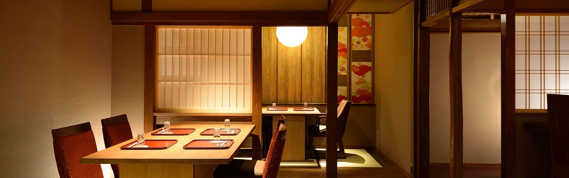 Kyokoyado Muromachi Yutone with a private dining room with table set for dinner.