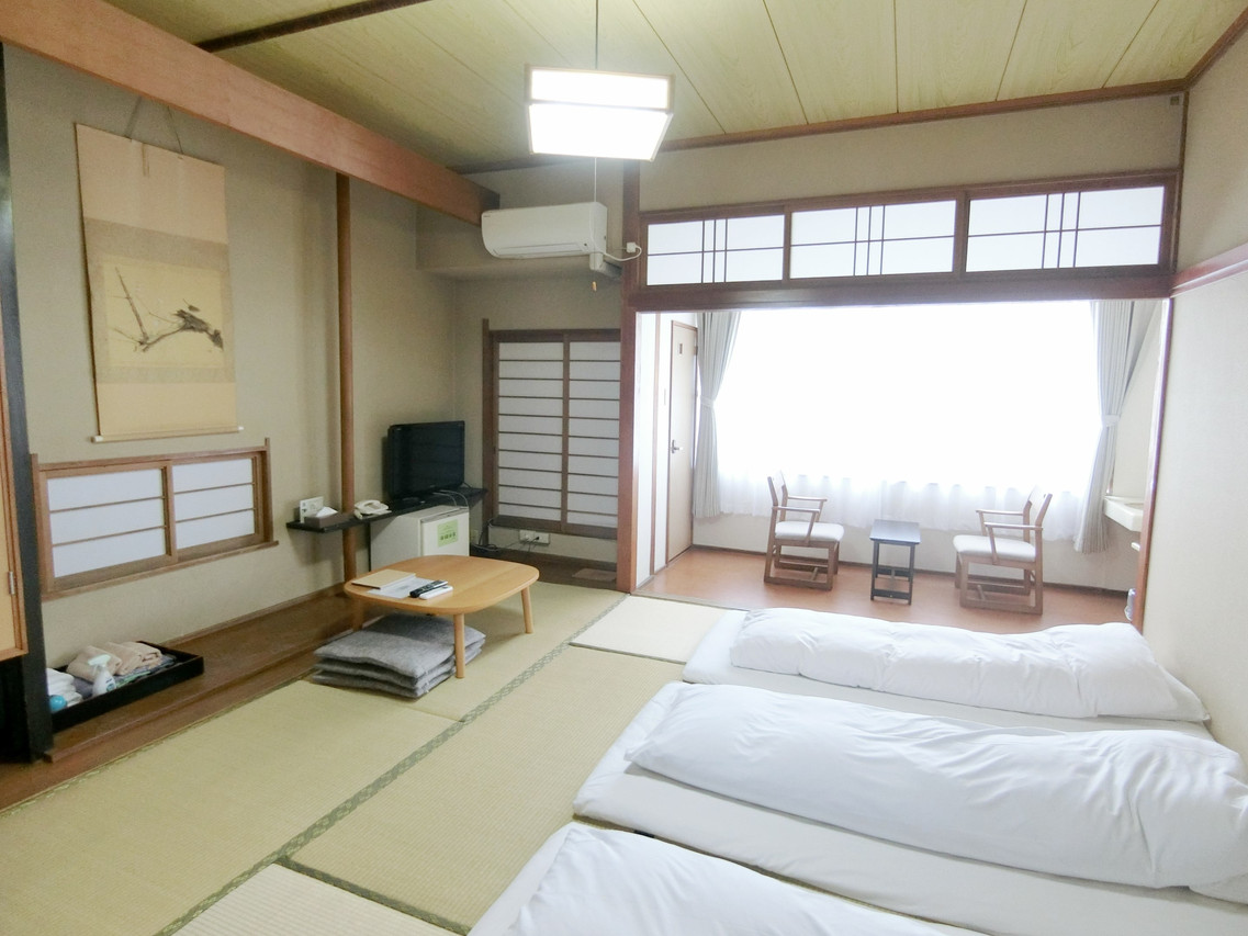 A Japanese-style room with twin beds.