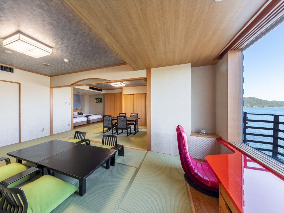 Japanese-style room with low table and water view.