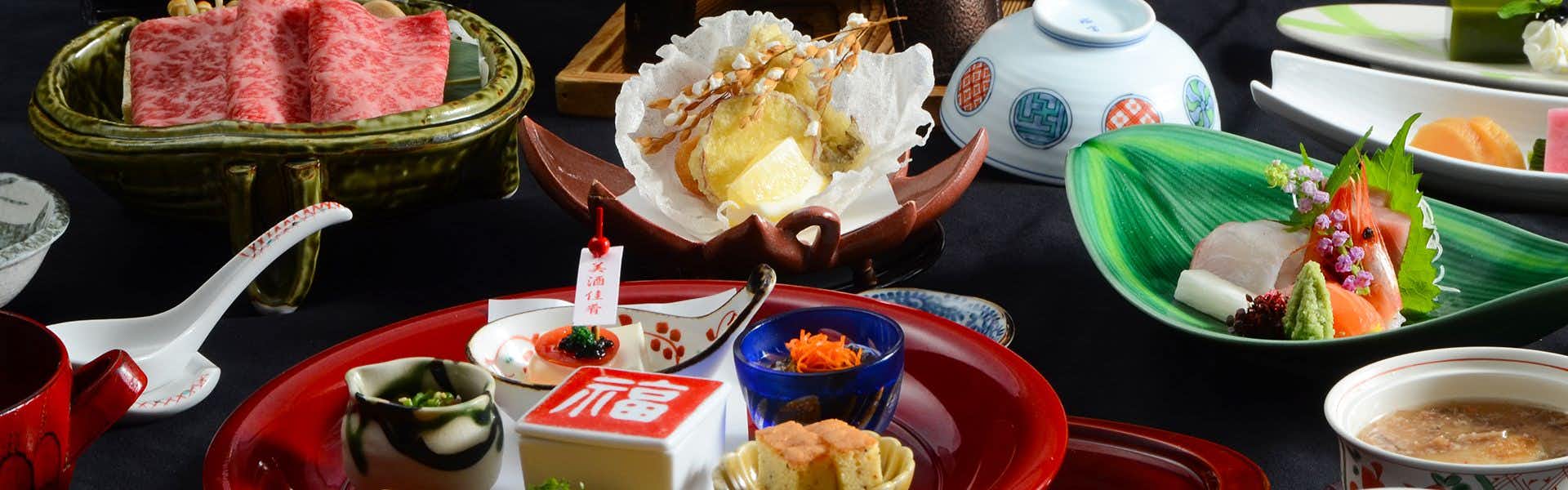 Nuno Han with a seasonal Japanese dinner featuring beef and seafood.