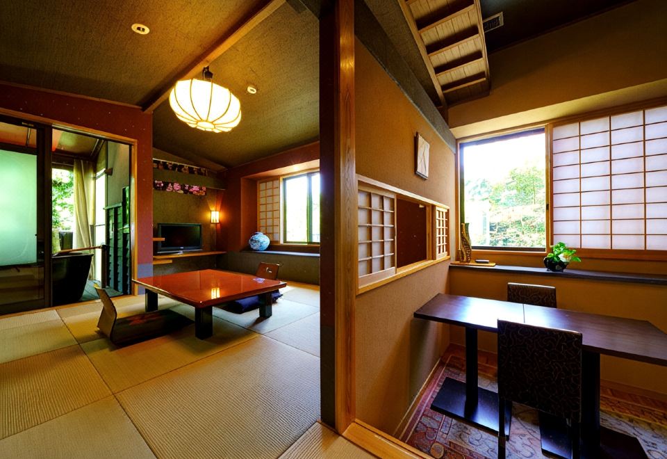 A traditional interior opens toward a garden through sliding screens.