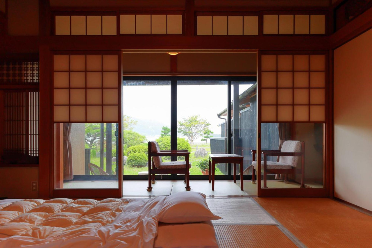 Tatami room opening toward a garden.