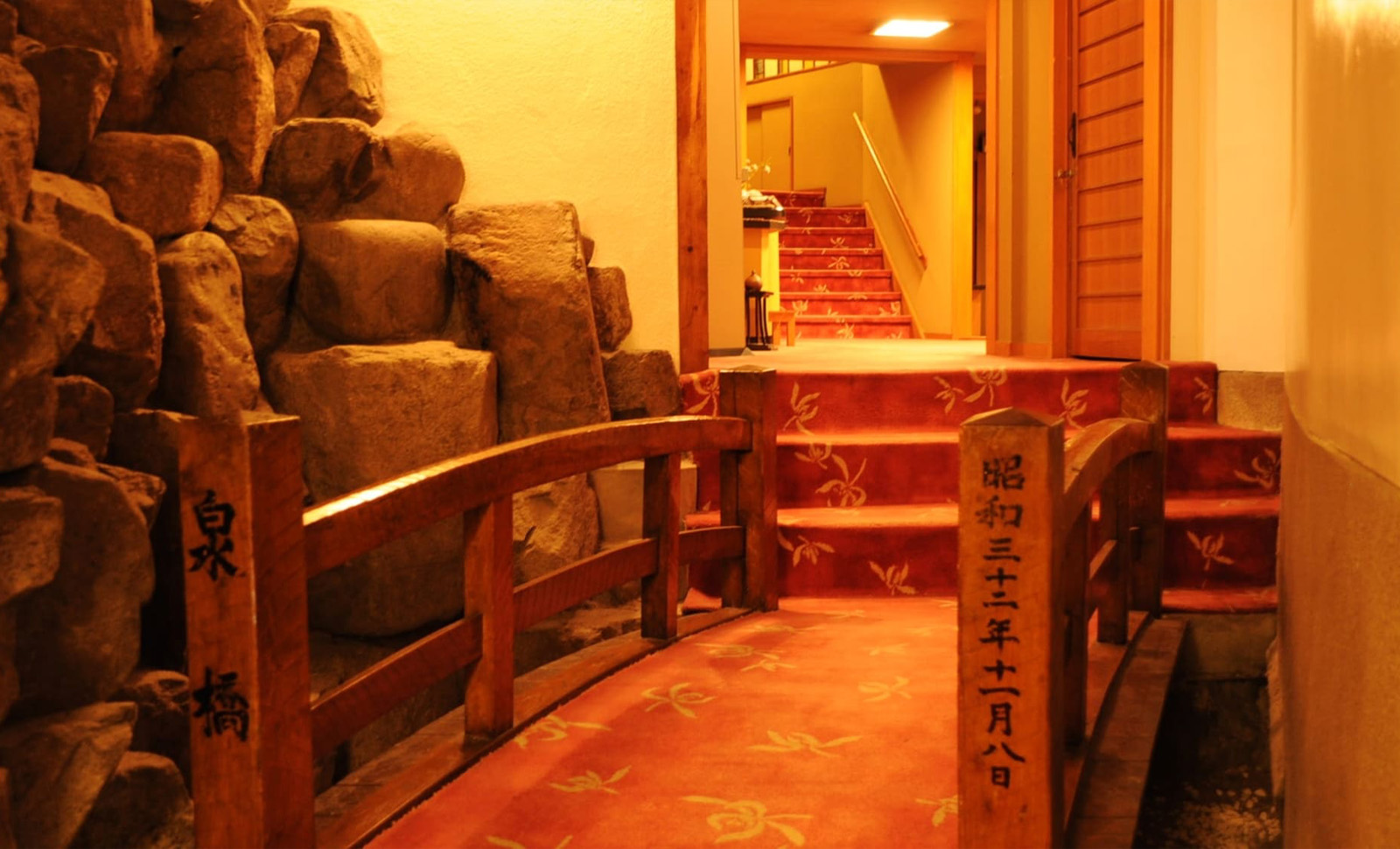 Stone-lined indoor entrance.