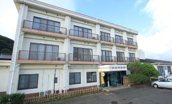 The multi-storey property facade and entrance.