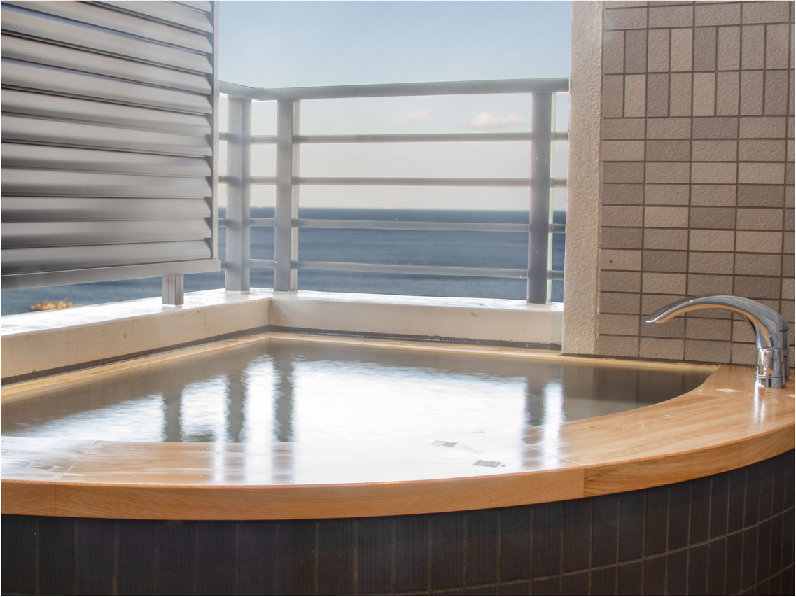 Outdoor bath overlooking the sea.
