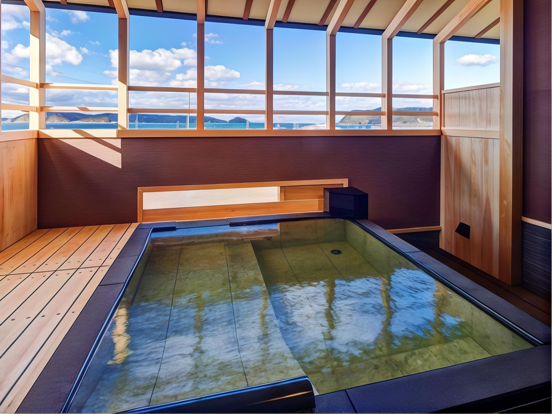 A rectangular bath enclosed by timber-framed windows with a sea view.