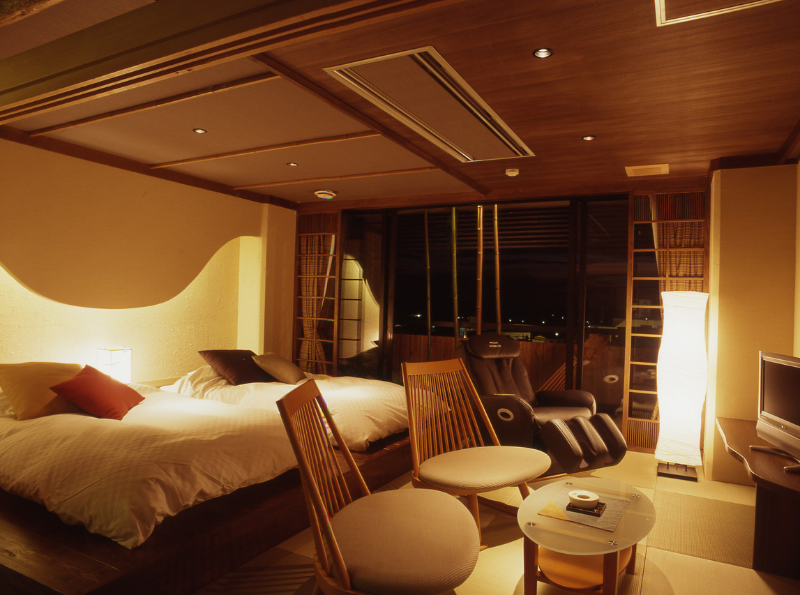 Western-style room with beds and chairs.