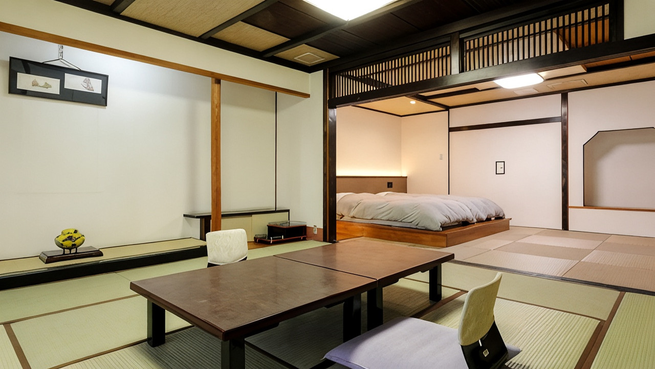 Japanese-style room with a low table and wide windows.