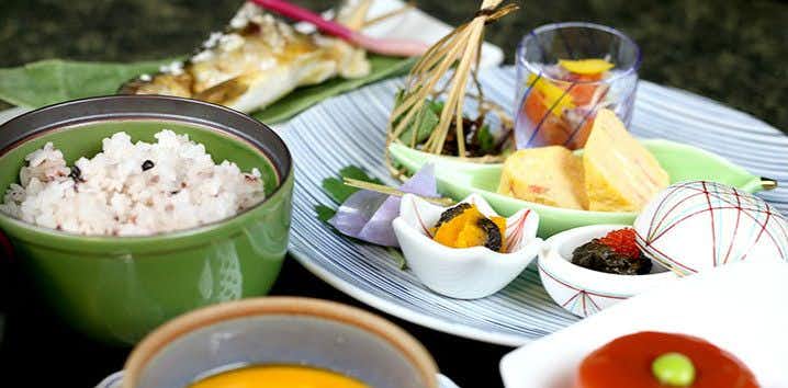 Hatago Azumaya with a Japanese breakfast arranged around rice and colorful side dishes.